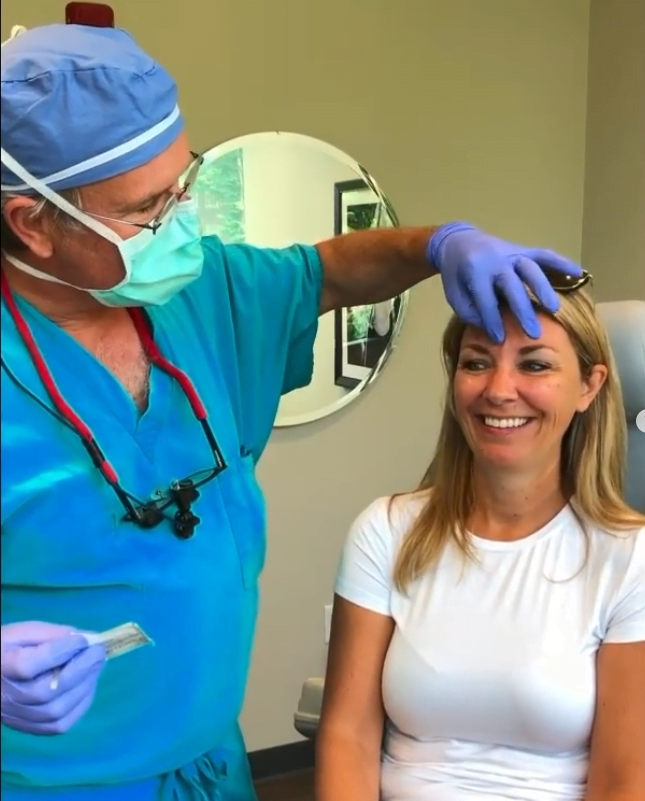 Dr. Claytor with a patient before a treatment